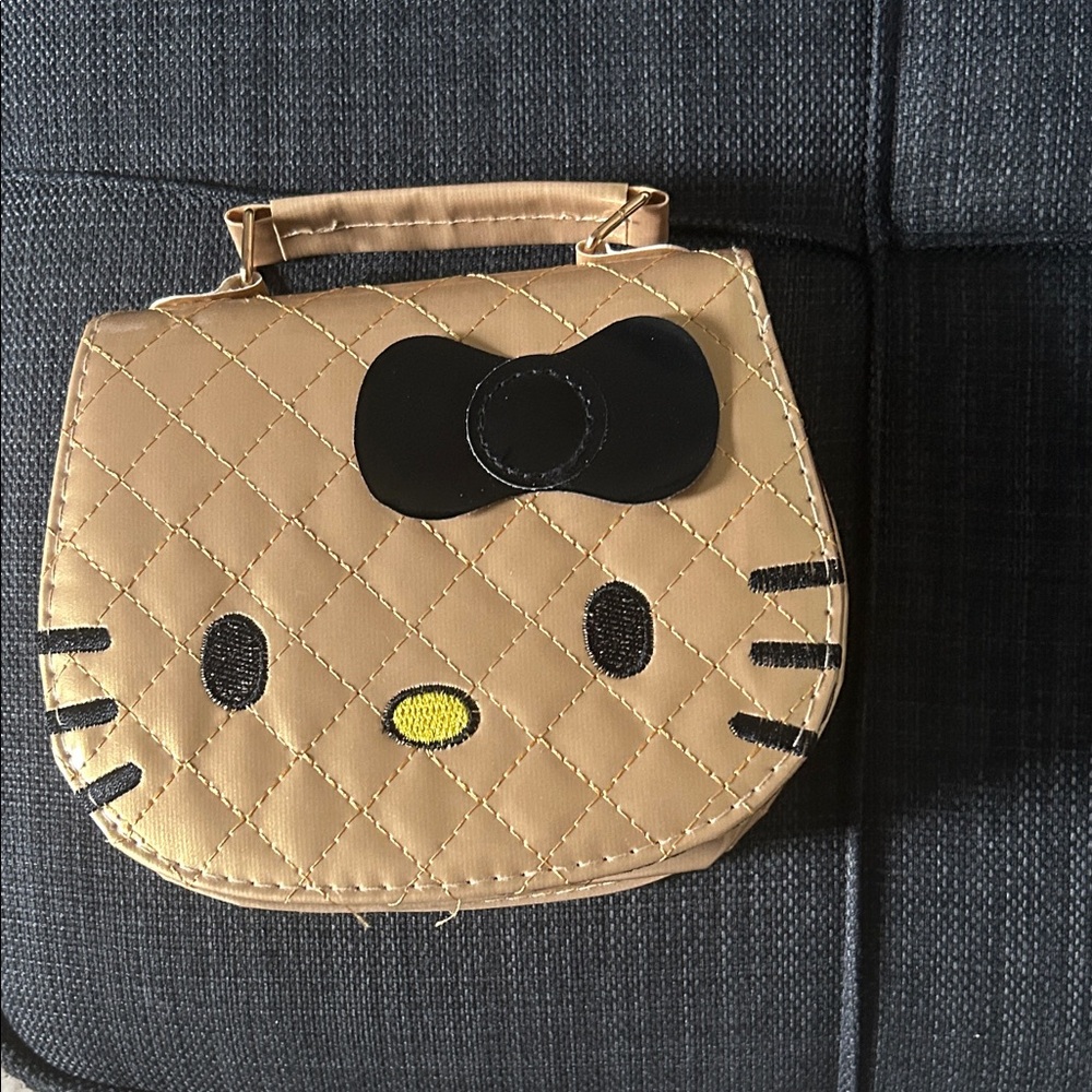 Hello Kitty Quilted Cosmetic Bag in Gold and Black